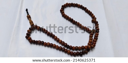a prayer beads on a white background for the worship of Muslims