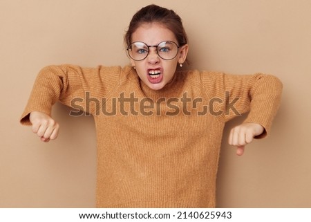 cute girl with glasses emotions gesture hands childhood unaltered