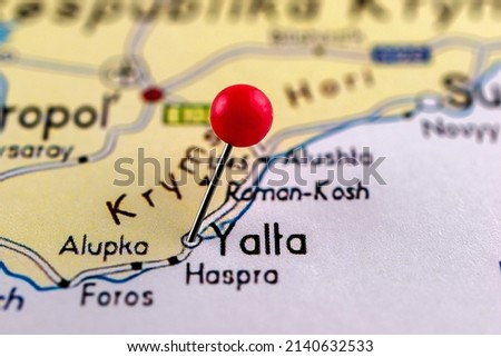 Yalta pinned on a map of Ukraine. Map with red pin point of Yalta in Ukraine.