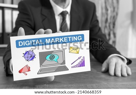 Businessman showing an index card with digital marketing concept