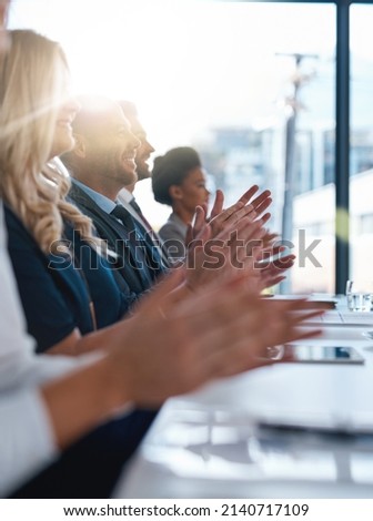 Giving recognition where recognition is due. Cropped shot of a group of unrecognizable businesspeople applauding during a business presentation. Royalty-Free Stock Photo #2140717109