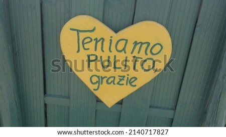 heart shaped sign with the inscription we keep clean thanks  - recycling and separate collection of waste in nature - environmental protection