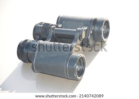 Optical device. Binoculars for viewing distant objects Royalty-Free Stock Photo #2140742089