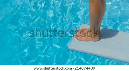 Taking the plunge Royalty-Free Stock Photo #214074409