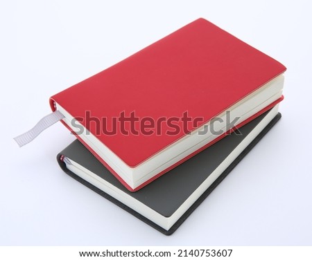 Two books on a white background. Isolated notepads. Royalty-Free Stock Photo #2140753607
