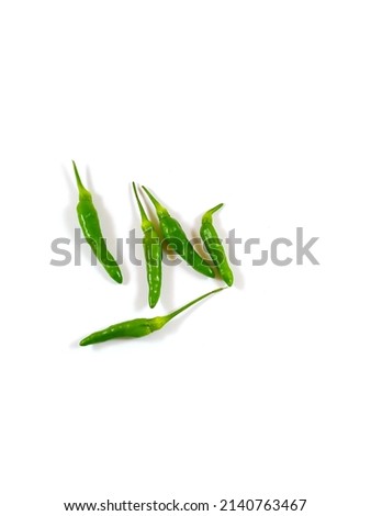 Bird's Eye chili (Capsicum annuum) isolated on white background, green chilli Royalty-Free Stock Photo #2140763467