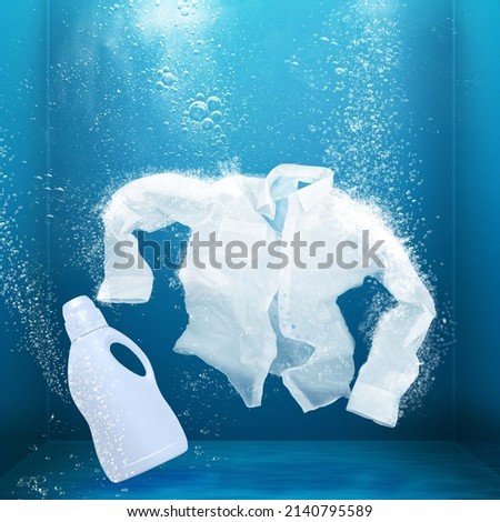 White shirt detergent bolons washed in water Royalty-Free Stock Photo #2140795589
