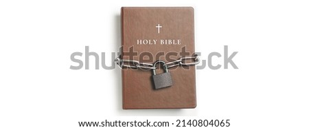 Bible. Book with lock. A closed book is banned. Chain and padlock wrapped the book. Royalty-Free Stock Photo #2140804065