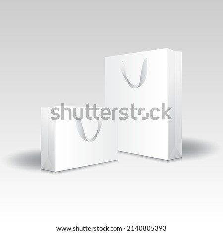 Blank white paper shopping bag or gift bag (2 sizes) with ribbon handles mockup template. Isolated on gray background with shadow. Ready to use for branding design. Realistic 3d vector illustration.