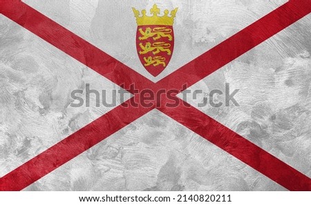 Textured photo of the flag of Jersey.