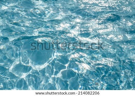 Abstract pattern of water waves in a pool.