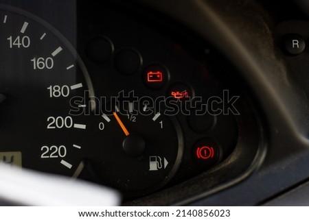 Screen display of car status warning light on dashboard panel symbols which show the fault indicators. low battery, lack of oil
