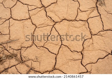Takyr cracks in dry soil. Cracked alumina
