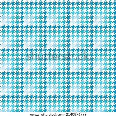 Blue hounds tooth pattern cloth. Hounds tooth fabric background. Textile design. Gradient blue color pattern on white backdrop.