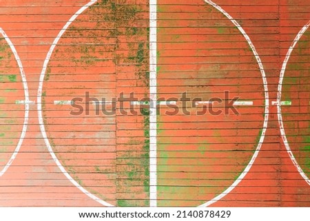 top view of the school gym with old wooden covering and multi colored paints of the world, background image, empty space for your slogan, tinting, vignetting, selective focusing