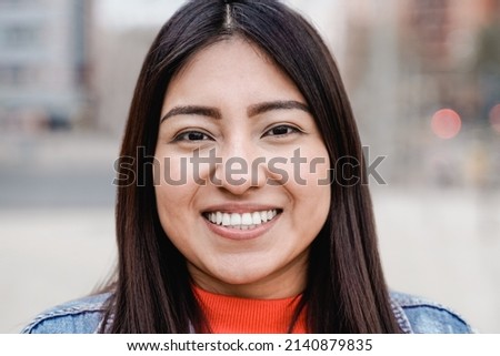 Native american happy girl smiling on camera outdoor - Focus on face
