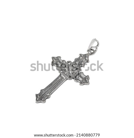 Silver crucifix necklace cross isolated on white background.