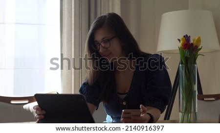 successful Young leader Woman in glasses Chatting Laptop Living Room. Writing Searching Using IT. Happy smiling Buisenes Lady Working leads conference Browsing Internet. Education, Technology Concept