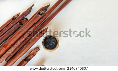 Islamic background of tools for quran calligraphy Royalty-Free Stock Photo #2140940837