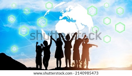 Environmental technology concept.Silhouette back view kids with Globe and Nature power icon technology.Sustainable development goals. SDGs.Children connection digital social ecology.Green industry. Royalty-Free Stock Photo #2140985473