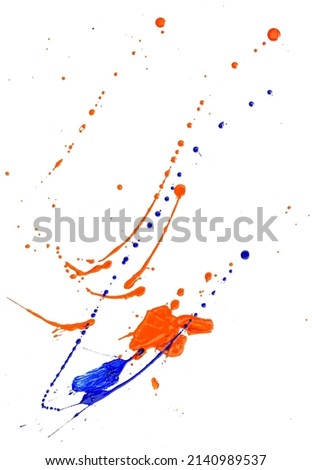 Drops of red and blue paint on a white background. Abstraction