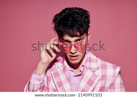 Photo of romantic young boyfriend self confidence pink plaid blazer fashion posing pink background unaltered