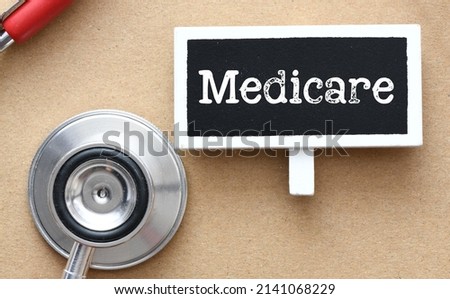 Medicare word on a small chalk board.