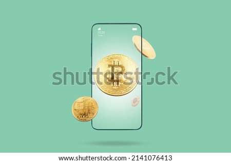 Close up of cell phone with bitcoins in screen. Copy space. Green background. Concept of cryptocurrency and e-commerce.
