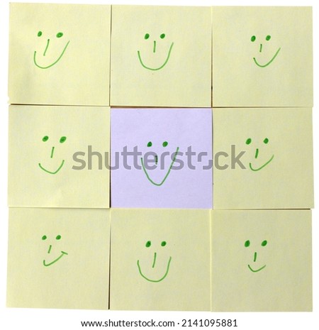 Paper notes with smilling face symbols.