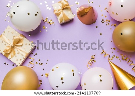 Flat lay party decoration concept on pastel colored background from above. Love concept. Holiday celebration. Valentine Day or birthday party decoration.