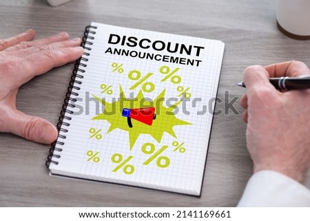 Discount announcement concept drawn on a notepad