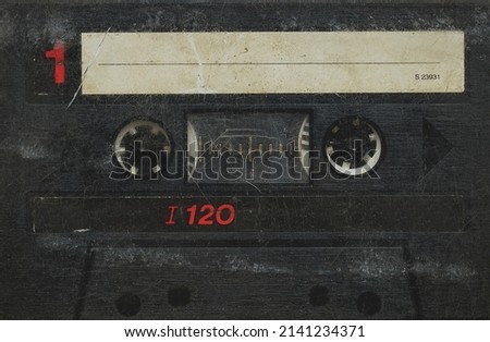 Old audio cassette. Retro background. Vintage wallpaper. 90s
