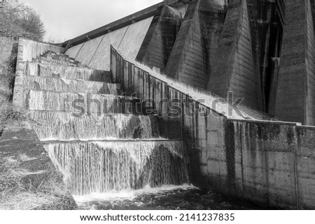 Long exposure of the waterfalls flowing over Wimbleball dam in Somerset