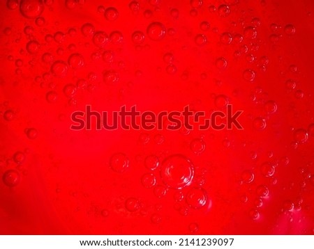 Bubbles on red background, abstract, with copy space