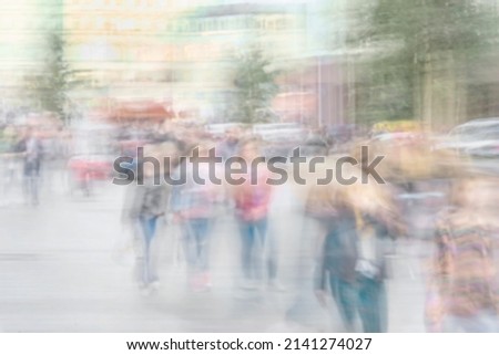 Abstract people walking on the city streets, summer sunny day, blurred light background. Concept modern city, shopping, love, lifestyle