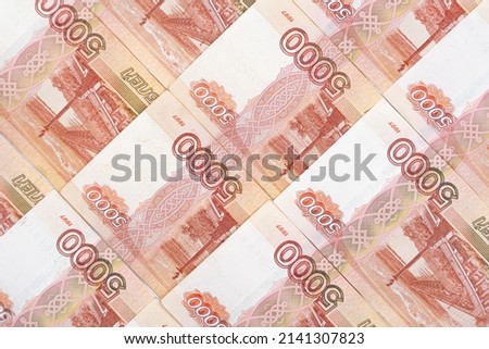 Russian money with a face value of five thousand rubles. Background from Russian money. High quality photo