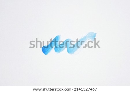 Blue brush stroke with watercolor isolated on white background