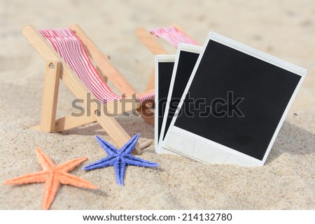 Starfishes and picture on sand
