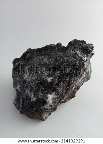 Quartz Magnetite stone on isolated white background