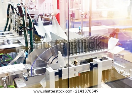 Tray packer for single-component packaging machine Royalty-Free Stock Photo #2141378549