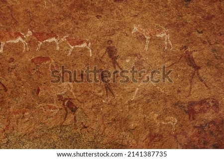 Close up view of wall with prehistoric art in Africa.