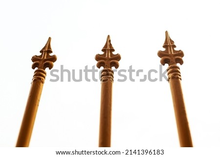 sharp-pointed steel vintage style adorned on the fence to prevent climbing Royalty-Free Stock Photo #2141396183