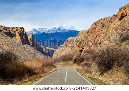 Road in mountains. Road with top of mountains and clouds. 