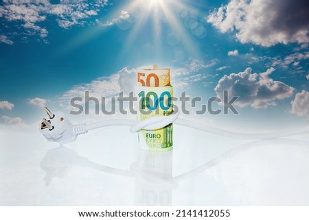 Roll of Euro banknotes tied up with an electrical plug. on clouds sky with sunbeam background. Concept of saving electricity at home. Electricity consumption costs and expensive energy concept.  