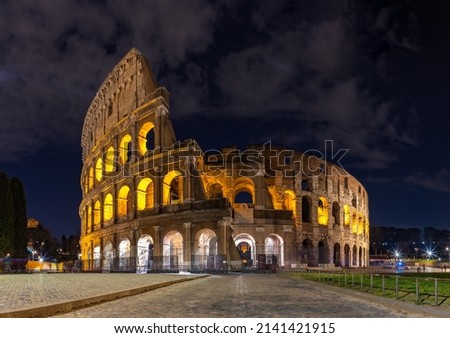 A picture of the Colosseum at night.
