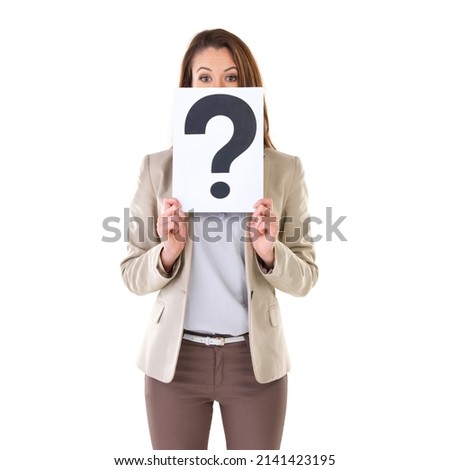 I have a question for you. Studio shot of a young businesswoman holding a placard with a question mark on it.