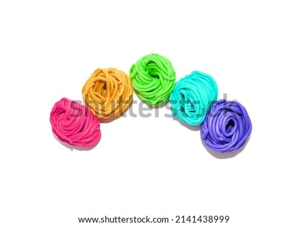 rainbow made of plasticine on a white background