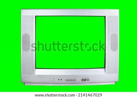 The old TV on the isolated. Old green screen TV for adding new images to the screen.  Royalty-Free Stock Photo #2141467029