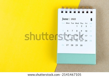 The June 2022 desk calendar on beautiful background. Royalty-Free Stock Photo #2141467105