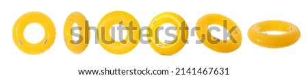 Set of yellow inflatable ring isolated on white Royalty-Free Stock Photo #2141467631